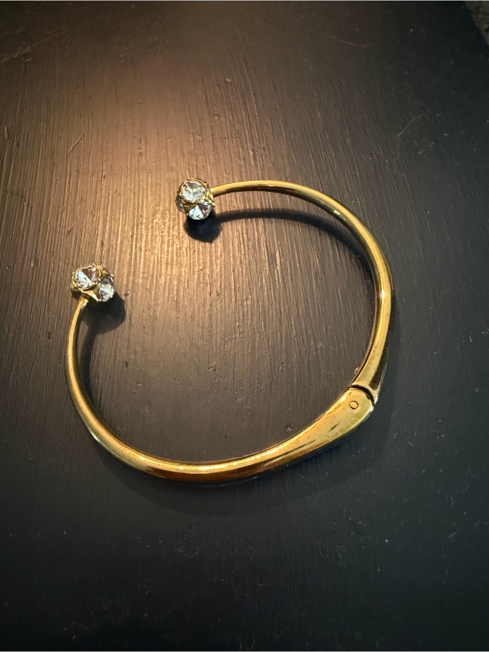 Kate Spade Goldtone Lady Marmalade hinge bracelet with crystal accents